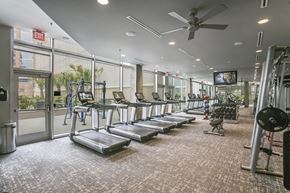 Dallas apartment for rent - Fitness center with cardio and strength equipment at Glass House Dallas, Texas
