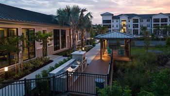 Summer kitchen with grilling stations and outdoor pizza oven