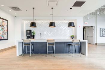 Social room and entertainment lounge with chef’s kitchen