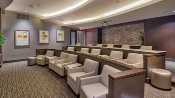 Private media and screening room featuring surround-sound and stadium seating