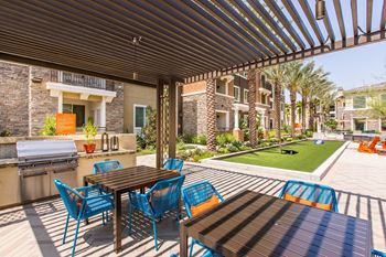 Outdoor grill with intimate seating area