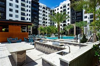 Outdoor poolside grilling area