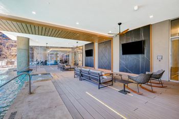 Elevated outdoor lounge with heated resort-style pool