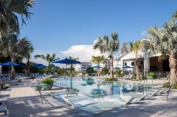 Expansive sundeck with lounge seating and private cabanas