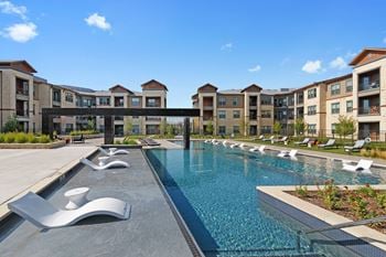 Outdoor seating and pool at windsor lakeyard district