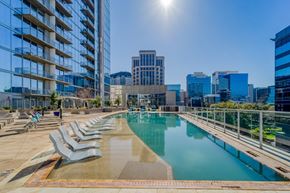 Dallas apartment for rent - Pool deck with lounge chairs at Glass House Dallas, Texas