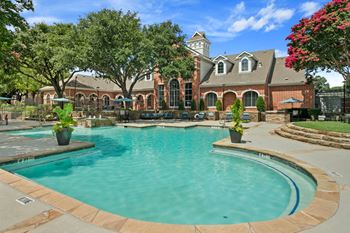 Resort-style pool with tanning deck