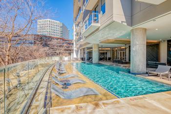 Elevated outdoor lounge with heated resort-style pool