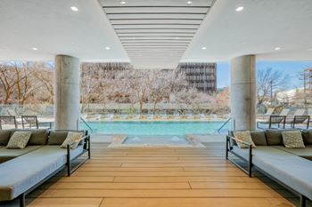 Elevated outdoor lounge with heated resort-style pool
