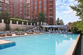 Washington apartment for rent - a swimming pool with a hotel in the background