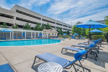 Pool and sundeck with chairs