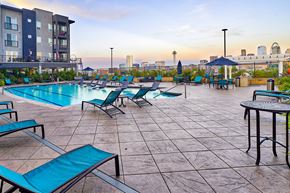 Denver apartment for rent - Pool deck with lounge chairs at Element 47 by Windsor, Denver, CO
