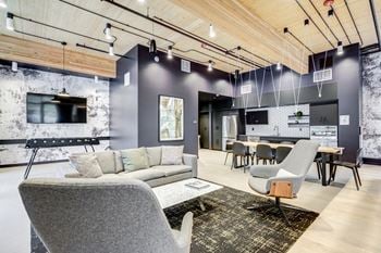 Resident lounge with billiards and kitchen