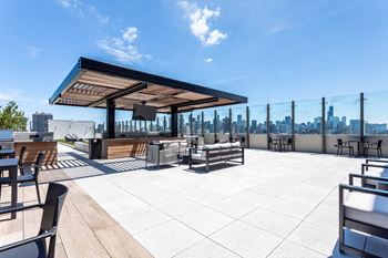 Spacious private terrace with fire pits and grilling stations