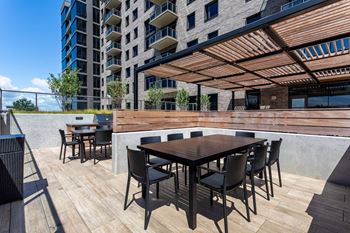 Spacious private terrace with fire pits and grilling stations