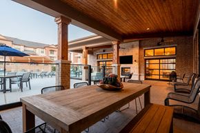 Carrollton apartment for rent - Outdoor Lounge Area With TV at Windsor Castle Hills, Carrollton, TX