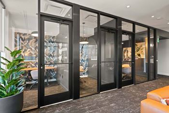 Work lounge and conference room space + private work pods