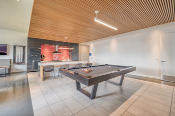 Clubroom with billiards, hdtv, cozy seating and gathering areas