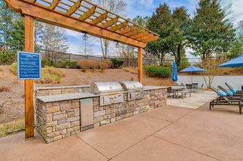 Outdoor kitchen and grilling station