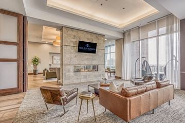Houston apartment for rent - a living room with a couch and a fireplace
