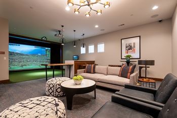 Multi-sport simulator and sports lounge with billiard table