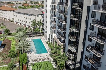 Two heated swimming pools with cabanas and sun deck