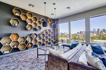 Rooftop game room and lounge with breathtaking skyline views