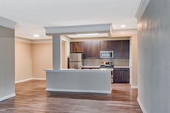 Open kitchen with counter-height breakfast bar