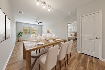 La Habra apartment for rent - a dining room and living room with a table and chairs