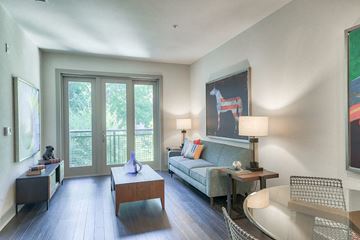 Austin apartment for rent - a living room with a couch and a table