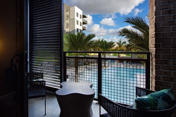 Private balcony overlooking pool 