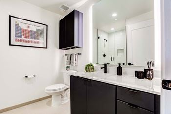 Spa-like bathrooms featuring moen designer finishes ceramic and porcelain tiles