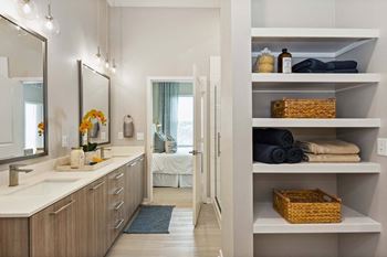 Bathrooms featuring built in linen shelving*