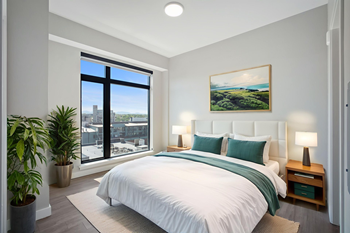 Luxury, wood-style flooring throughout bedroom and closet