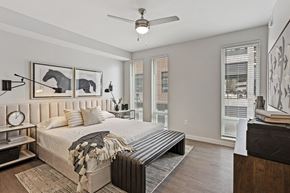 Atlanta apartment for rent - a bedroom with a bed and a large window