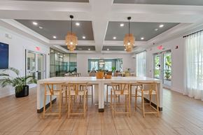 Pembroke Pines apartment for rent - the dining room of a home with a large table and chairs
