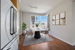 Los Angeles apartment for rent - a dining room with a table and chairs and a window