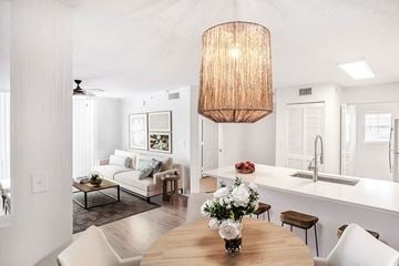 Pembroke Pines apartment for rent - a living room with a dining room table and a kitchen