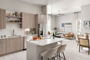 Stainless steel whirlpool appliances with side-by-side refrigerator and in-door water and ice