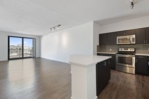 Denver apartment for rent - Espresso Cabinetry and White Countertops at Windsor Riverfront Park, Denver, 80202