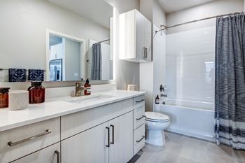 Ceramic tile surrounding tub*
