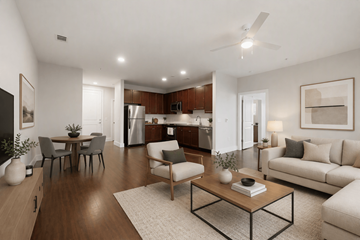 Denver apartment for rent - A modern living room with a dining table and chairs.