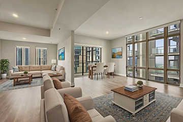 Austin apartment for rent - A modern living room with a large couch and a coffee table.