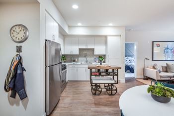 Large island kitchen with custom cabinetry