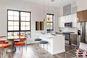 Waltham apartment for rent - Chef Inspired Kitchens with Breakfast Bar at Edison on the Charles by Windsor, Waltham, MA, 02453