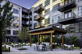 Outdoor grill with intimate seating area