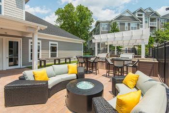 Outdoor grill with intimate seating area