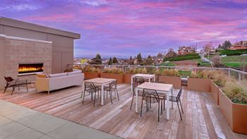 Rooftop deck with expansive city views, an outdoor kitchen and grilling station
