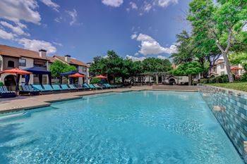 Resort inspired pool with sundeck