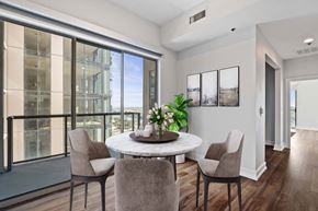 Austin apartment for rent - Dining area and balcony at Windsor on the Lake, 43 Rainey Street Austin, TX 78701